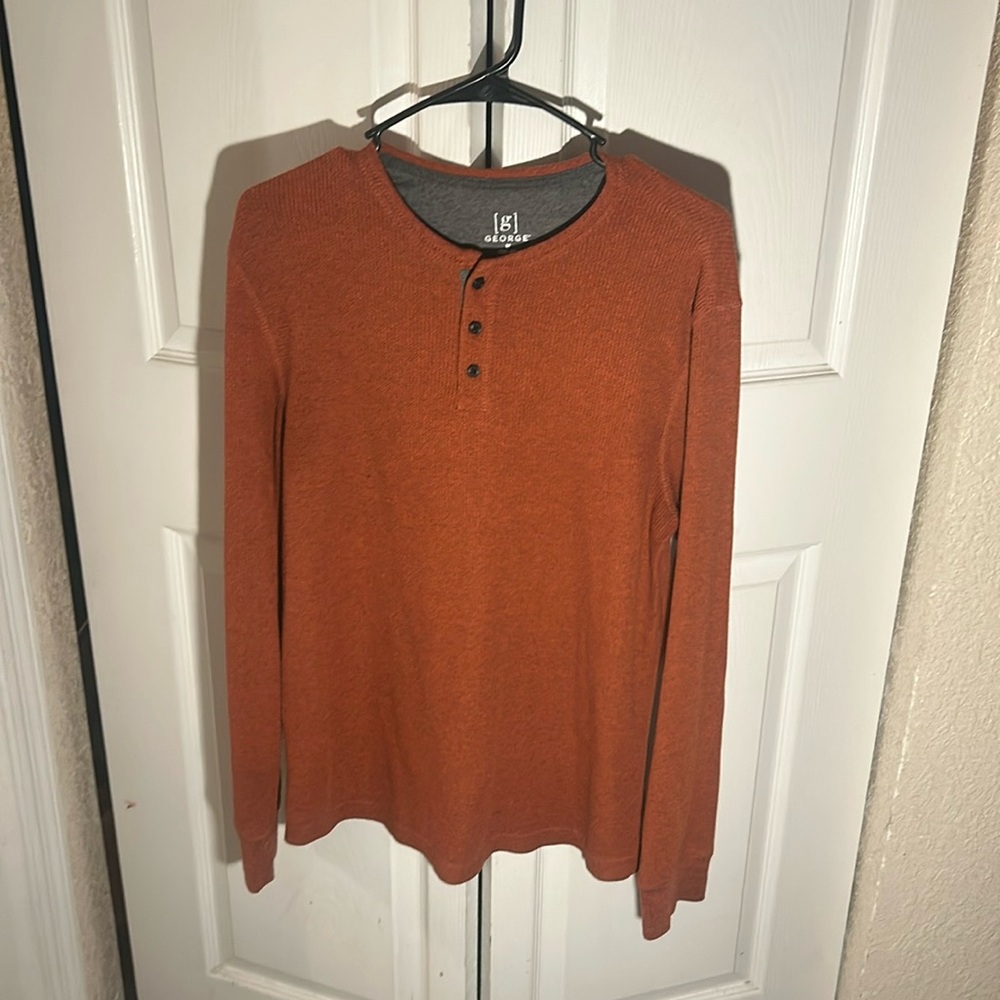 Orange button up sweater